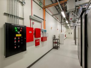 Image showing a fire alarm panel display, highlighting common issues for fire alarm panel troubleshooting in a building.